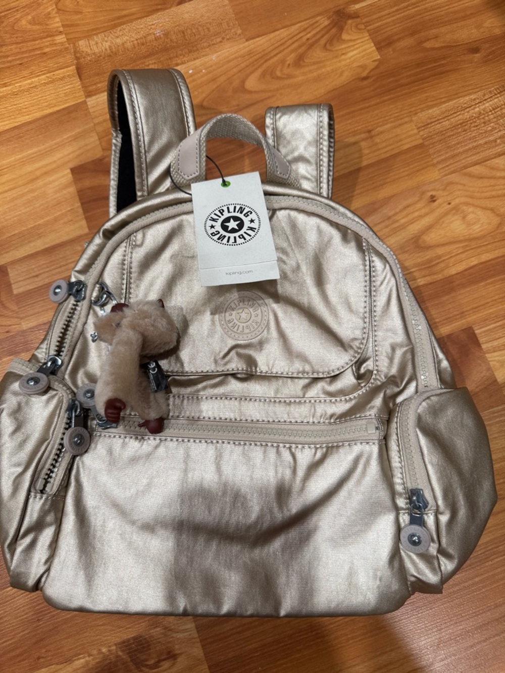 Kipling Shimmering Champagne Mini Backpack